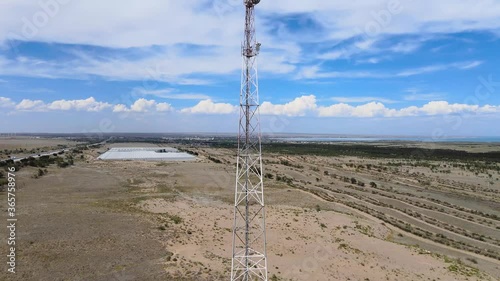 Telecommunication tower with sector antennas of a mobile operator and radio relay equipment with a microwave communication line and transmitting antennas gsm mast 5g 4g 3g. Modern technologies. photo