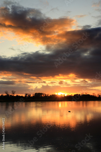 Colorful sunset by the Odra River, Poland.