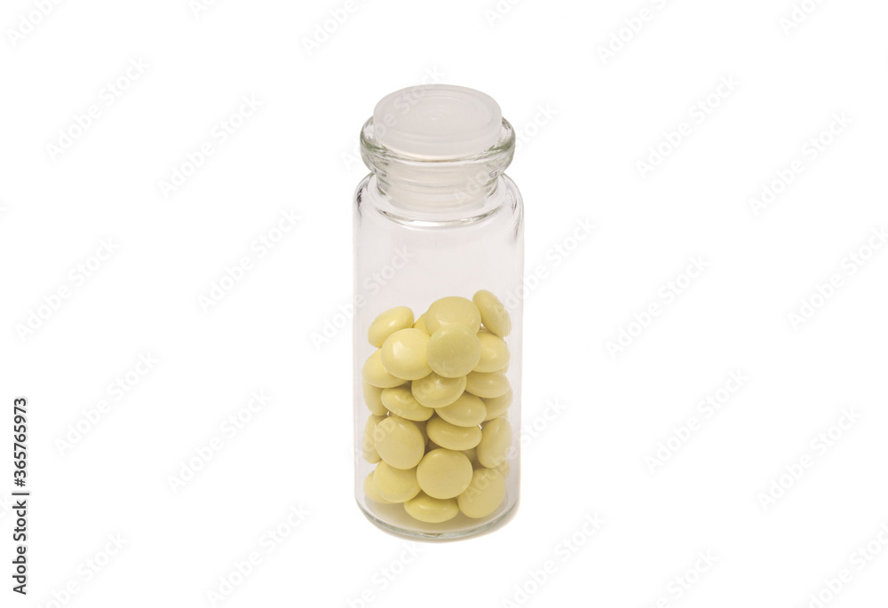 Glass bottle of pills tablets isolated on white Glass bottle of pills tablets isolated on white