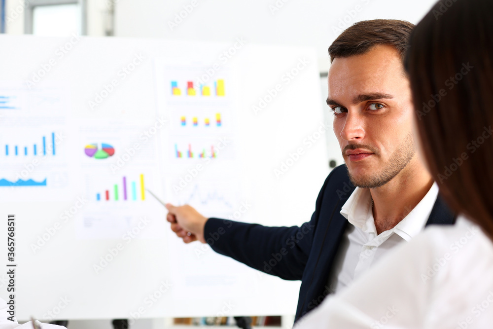 Group of people deliberate on white board problem in office portrait. Graph consult, idea participate, creative talk, review situation job, document explain, train, successful decision concept Group of people deliberate on white board problem in office portrait. Graph consult, idea participate, creative talk, review situation job, document explain, train, successful decision concept