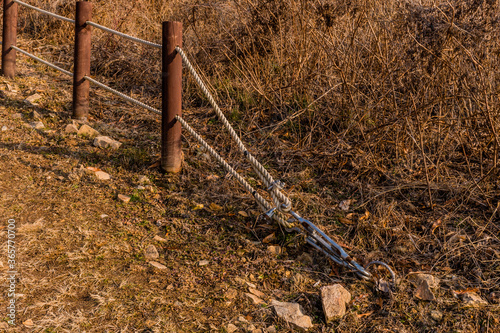 Turnbuckle securing rope fence