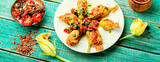 Fried zucchini flowers with filling.