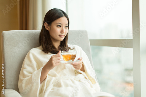 Photography Pretty young girl drinking tea indoors