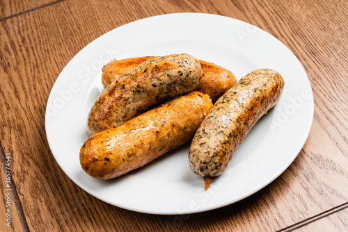sausages on the white plate