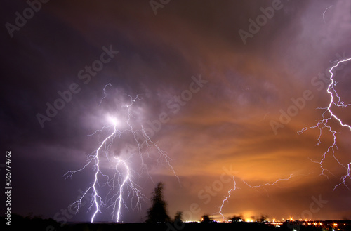 lightning bolts in the night sky during a thunderstorm
