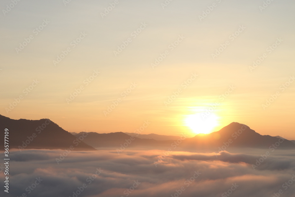 Fototapeta premium Beautiful landscape in mountains at sunrise, travel concept background, Phu Thok Loei, Thailand
