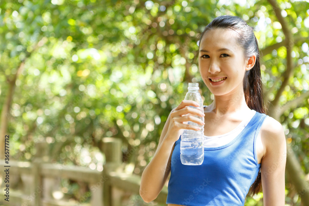 Young Asian woman doing exercise outdoors Young Asian woman doing exercise outdoors
