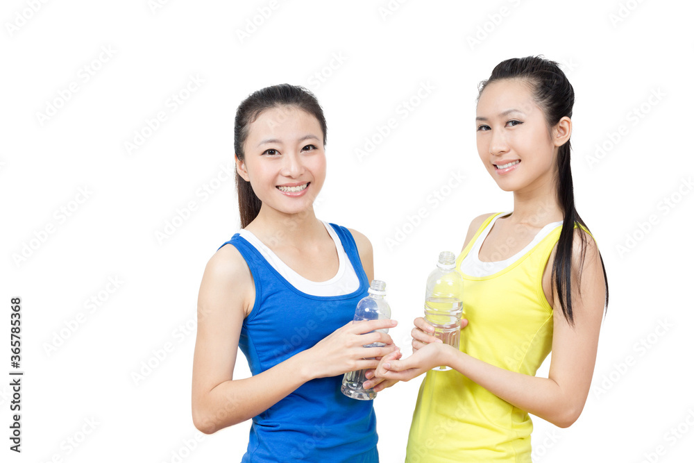 Young Asian women having rest after exercise in the gym Young Asian women having rest after exercise in the gym