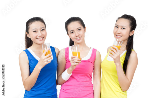 Young Asian women having rest after exercise in the gym