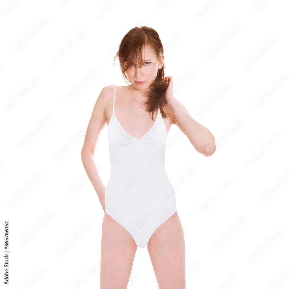 Gorgeous young woman wearing a white bathing suit, closeup portrait isolated in front of white studio background Gorgeous young woman wearing a white bathing suit, closeup portrait isolated in front of white studio background
