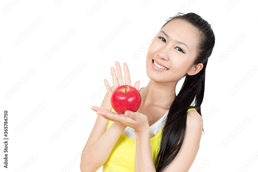 Young Asian woman eating apple after exercise in the gym Young Asian woman eating apple after exercise in the gym