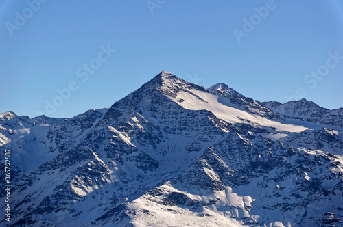 Mountain peak under snow in Dolomites, Northern Italy, Bormio region.