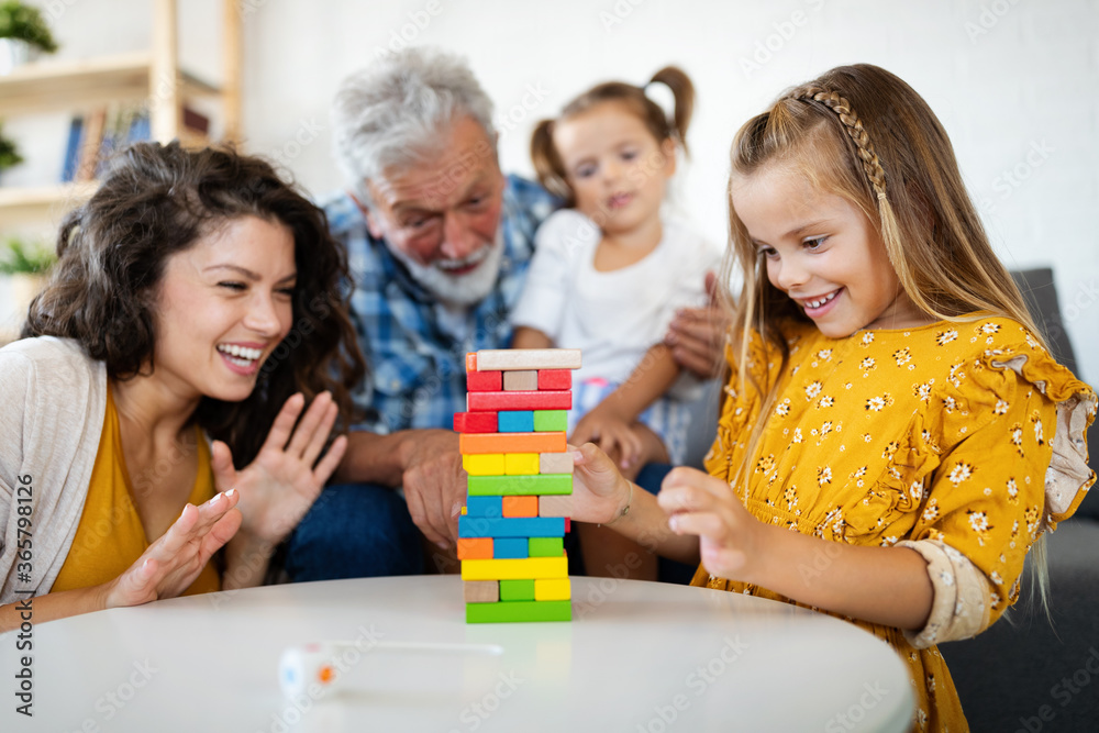 Happy family playing together at home, happiness concept Happy family playing together at home, happiness concept