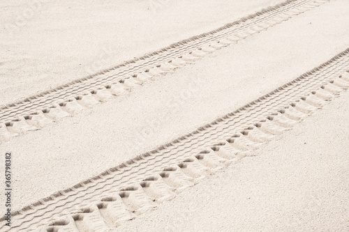 Wheel marks on sandy beach