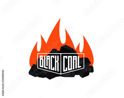Pile of burning coal charcoal, graphite coal,lump of coal with flames isolated on black