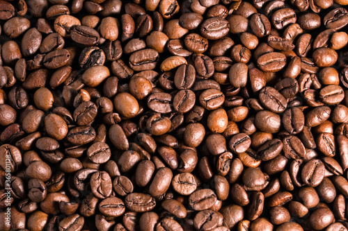 Roasted coffee beans texture background, brown grains