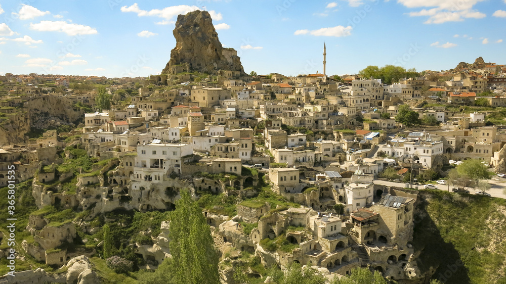 The great tourist attraction of Cappadocia on a blue sky day. Cappadocia is known around the world as one of the best places to fly with hot air balloons.