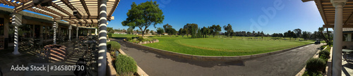 Panoramic view of a golf club in Lake San Marcos. There is a restaurant inside the golf club.