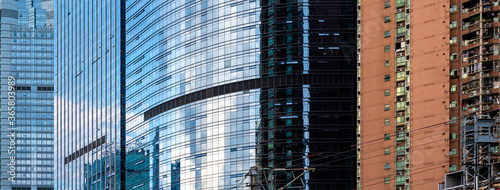 glass buildings with cloudy...