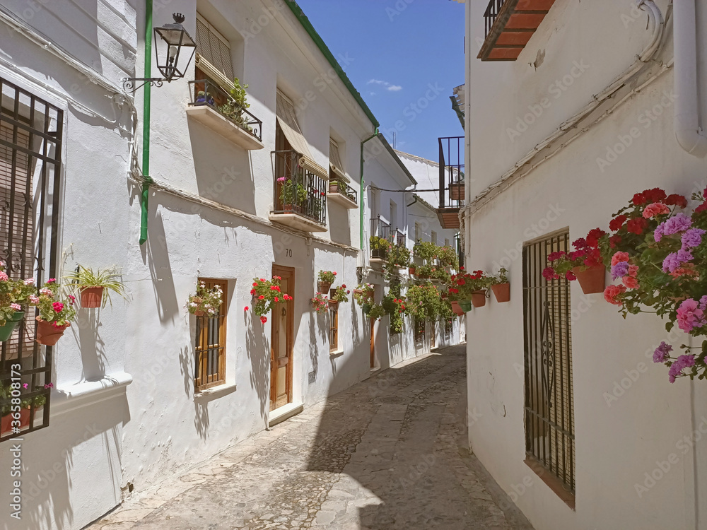 Cordoba, Spain - June 25, 2020:  Streets full of flowers in old town of Priego de Córdoba Andalusia Spain