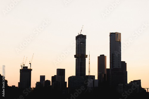 City skyline silhouette at sunrise 