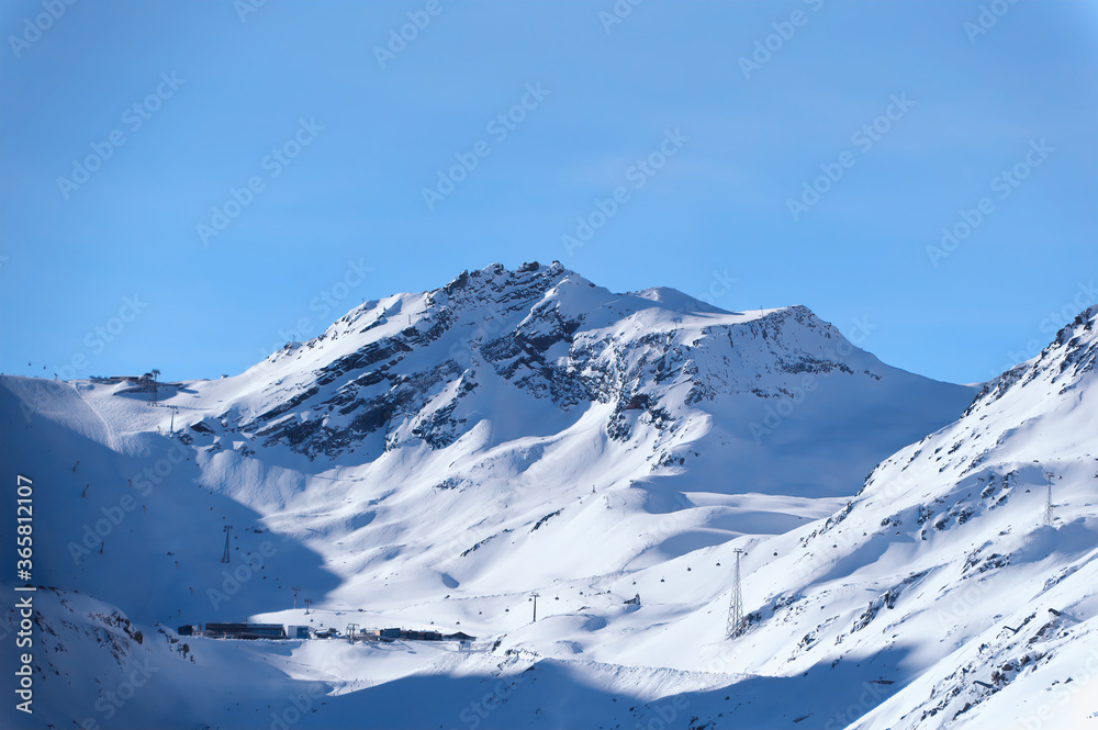Mountains covered with fresh snow on cold winter day in popular ski resort Obergurgl/Hochgurl in Austria.