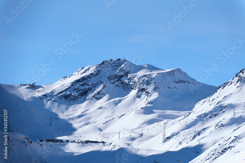 Mountains covered with fresh snow on cold winter day in popular ski resort Obergurgl/Hochgurl in Austria. © Goran