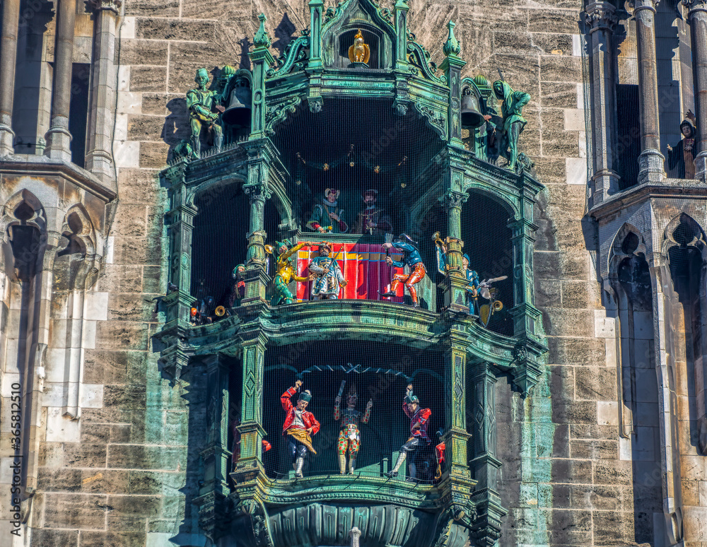 Plakat The Rathaus Glockenspiel of Munich, is a tourist attraction at Marienplatz, the heart of Munich, Germany.
