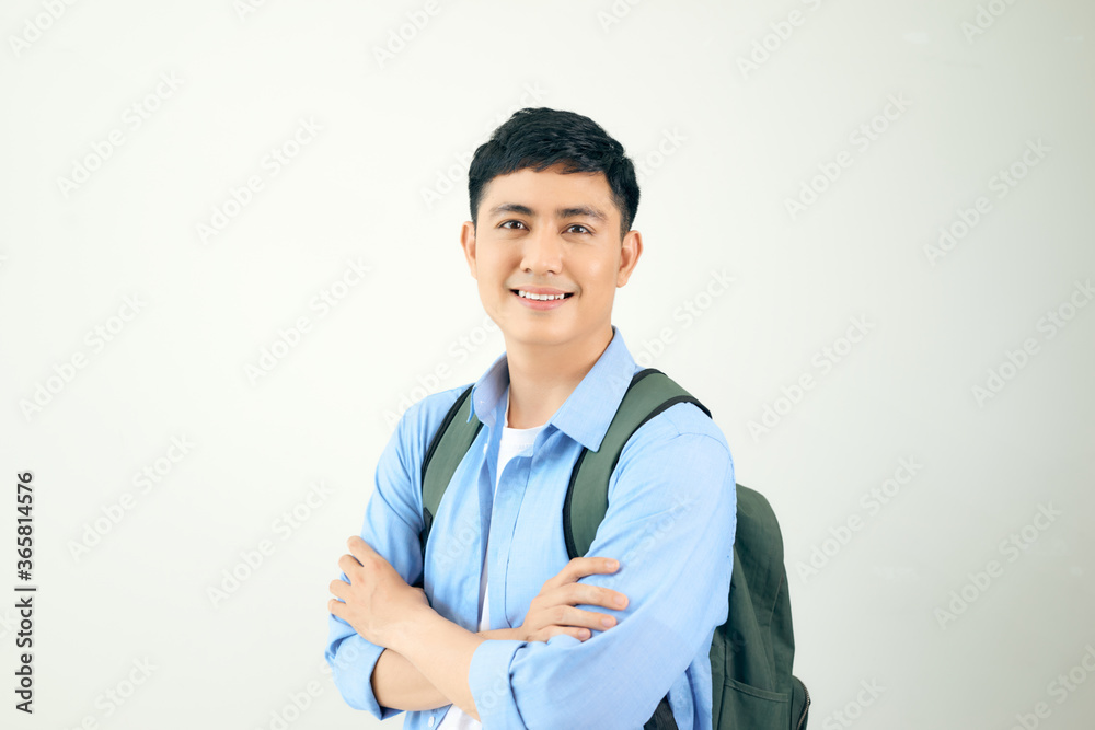 Handsome and friendly face man self-confident positive expression with crossed arms on white background Handsome and friendly face man self-confident positive expression with crossed arms on white background