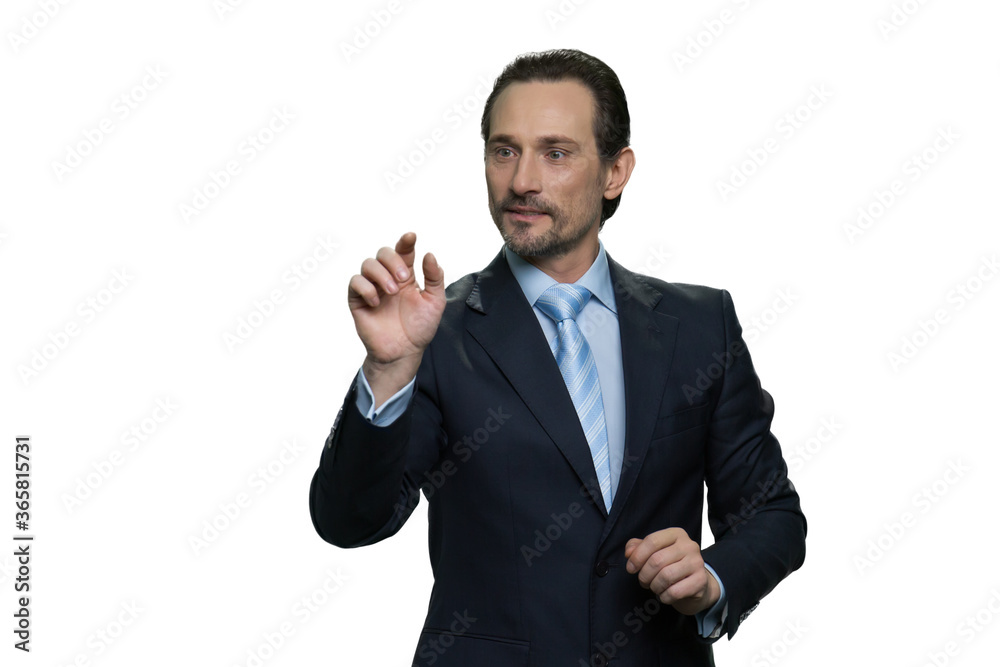 Middle-aged businessman using virtual screen on white background. Mature man in the jacket isolated on white background. Middle-aged businessman using virtual screen on white background. Mature man in the jacket isolated on white background.