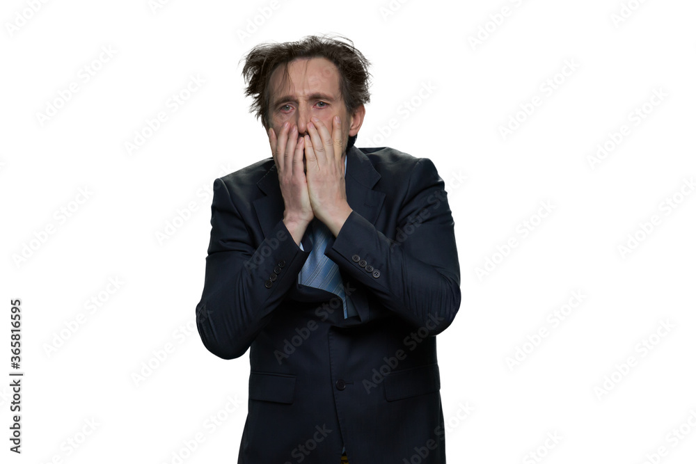 Exhausted formal-dressed businessman. Tired mature man in suit isolated on white background. Exhausted formal-dressed businessman. Tired mature man in suit isolated on white background.
