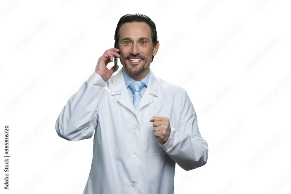 Good doctor is calling on the phone. Successful medic in white robe isolated on white background. Good doctor is calling on the phone. Successful medic in white robe isolated on white background.