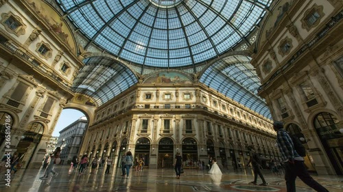 Timelapse inside Galleria Vittorio Emanuele II, famous place for shopping and fashion in the city centre of Milan, Italy.