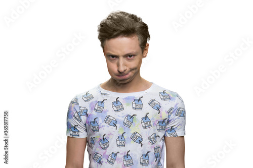 Wallpaper Mural Funny boy making a face. Cheerful teenager is blowing his cheeks. Portrait of american boy isolated on white background. Torontodigital.ca