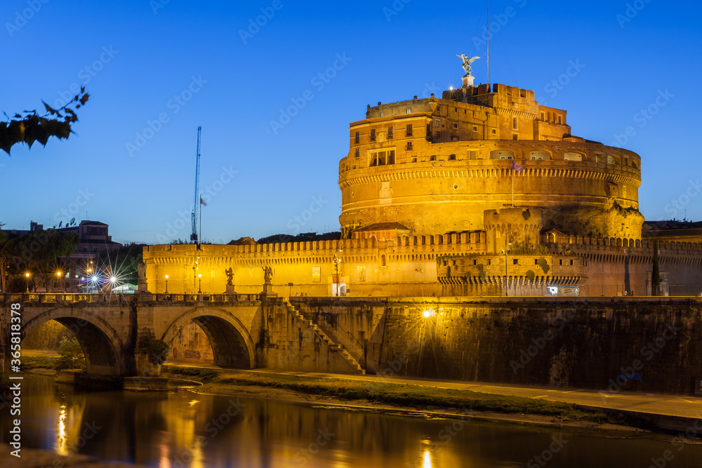 ROME, ITALY - 2014 AUGUST 18. View of Castel Sant Angelo and Tiber River in the evening.