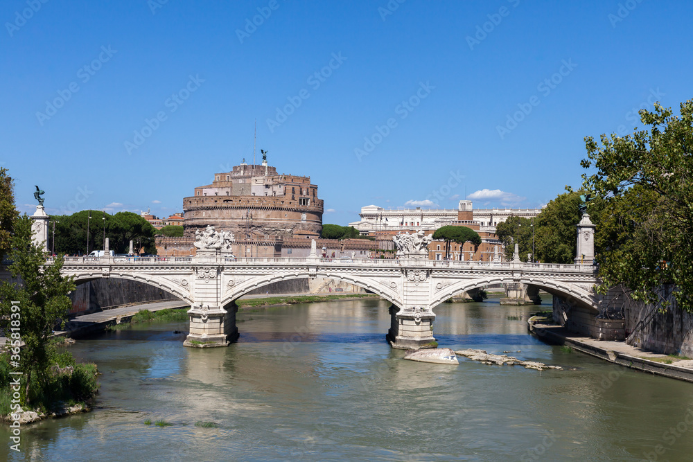 ROME, ITALY - 2014 AUGUST 18. View of Castle Sant Angelo on the banks of the River Tiber in Rome. 