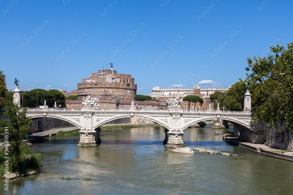 Obraz premium ROME, ITALY - 2014 AUGUST 18. View of Castle Sant Angelo on the banks of the River Tiber in Rome. 