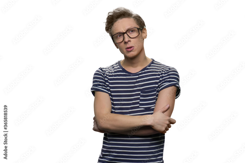 Portrait of smart thoughtful nerdy guy with folded arms. Intelligent teen boy against white background. Portrait of smart thoughtful nerdy guy with folded arms. Intelligent teen boy against white background.