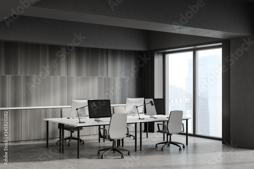 Grey and wooden open space office corner © ImageFlow