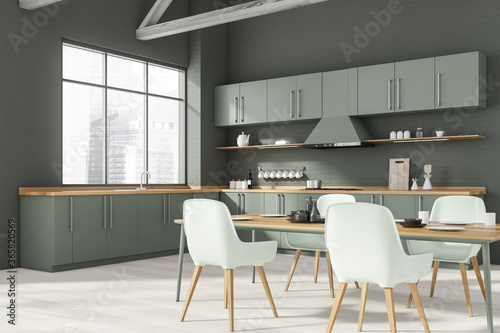 Grey kitchen corner with dining table