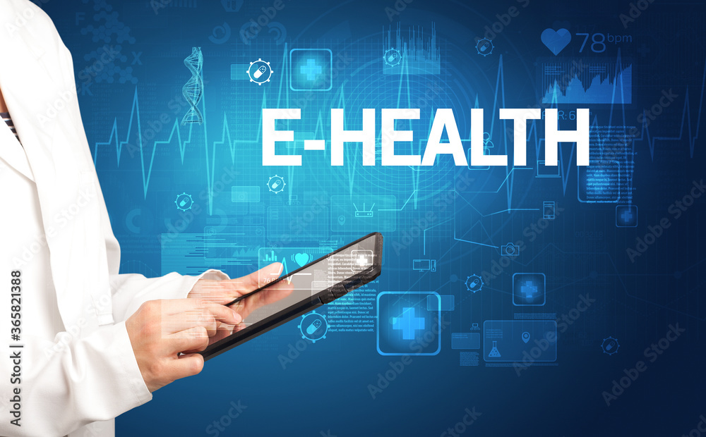 young doctor writing down notes with E-HEALTH inscription, healthcare concept young doctor writing down notes with E-HEALTH inscription, healthcare concept