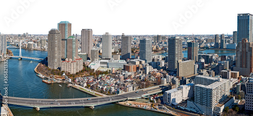 Panoramic view of Sumida river in Tokyo with wavy water  boats  bridges and skyscrapers from above