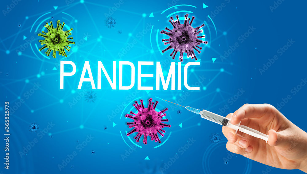Syringe, medical injection in hand with PANDEMIC inscription, coronavirus vaccine concept