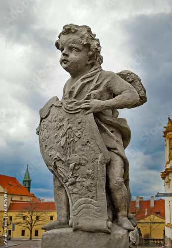 Sculpture of cherub in Prague, Czech Republic © kosobu