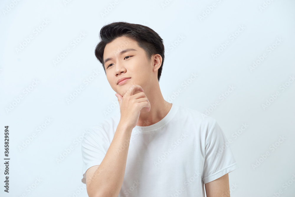 Shirtless young hamdsome attractive Asian man with clean radiant face for male beauty and skin care concepts Shirtless young hamdsome attractive Asian man with clean radiant face for male beauty and skin care concepts