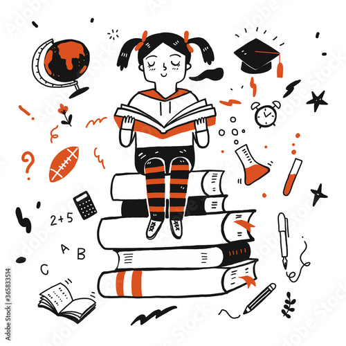 Young student girl reading a book