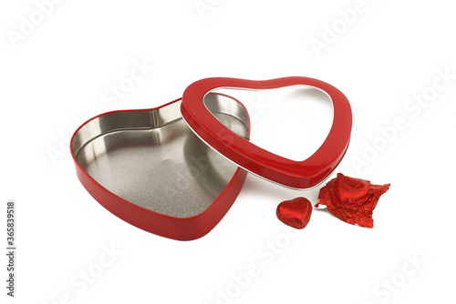 Red heart shaped box with chocolate candy
