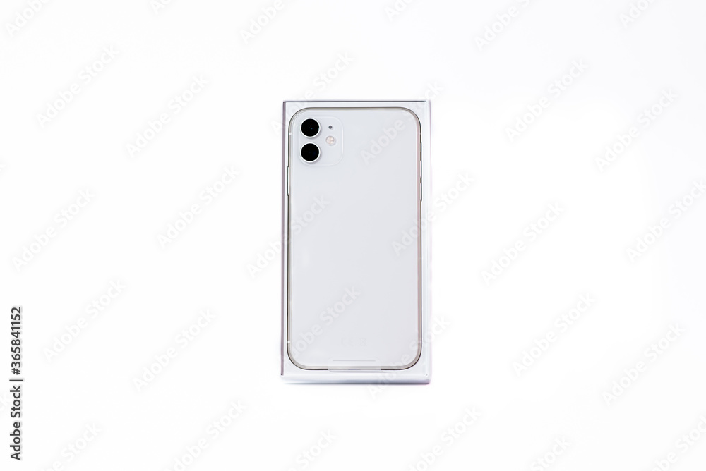 White smartphone with two cameras on a white background White smartphone with two cameras on a white background