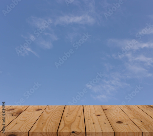 wooden floor and blue sky