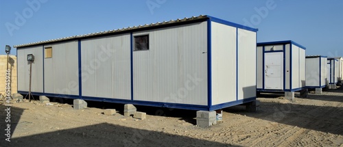 Portacabin, porta cabin, temporary labours camp , Mobile building in industrial site or office container Portable house and office cabins. Labor Camp. Porta cabin. small temporary houses © KG
